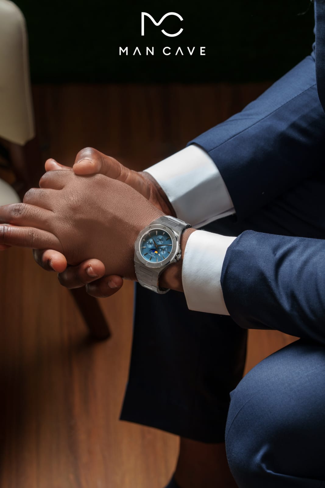 Man Cave Signature Moonphase — ice-blue dial worn with a navy suit